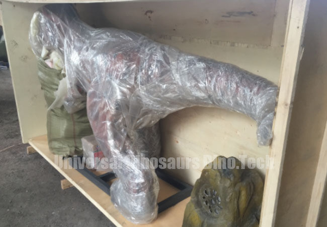 Place Animatronic Dinosaur Inside Crate